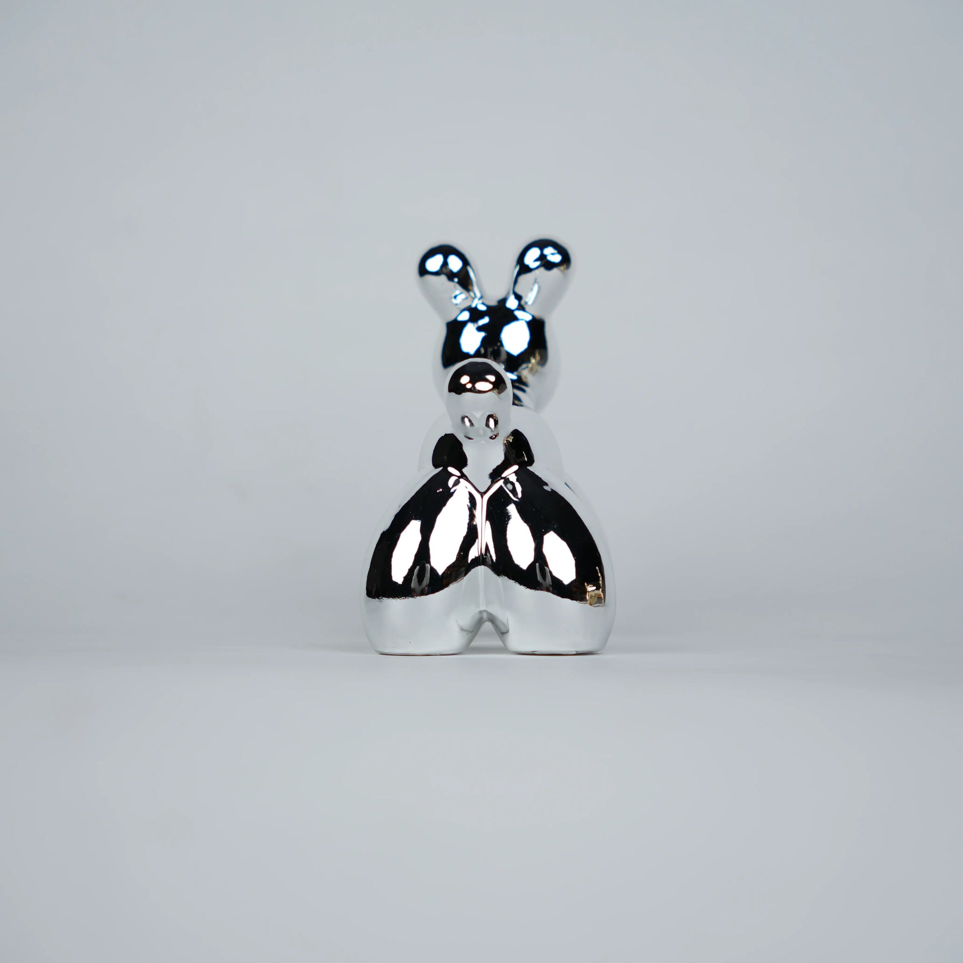 silver chrome decor poodle statues