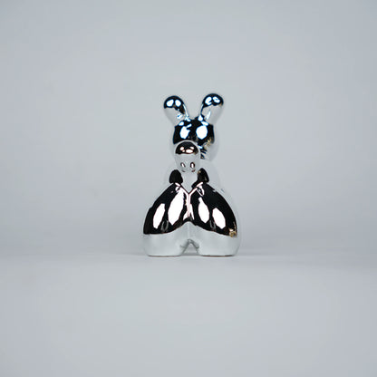 silver chrome decor poodle statues