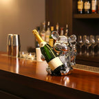 Luxury bear wine bottle holder featuring a chrome finish with an integrated corkscrew, designed to display wine bottles while adding elegance to home bars, dining rooms and contemporary interiors.