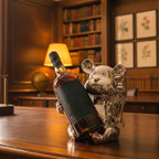 Luxury bear wine bottle holder featuring a chrome finish with an integrated corkscrew, designed to display wine bottles while adding elegance to home bars, dining rooms and contemporary interiors.