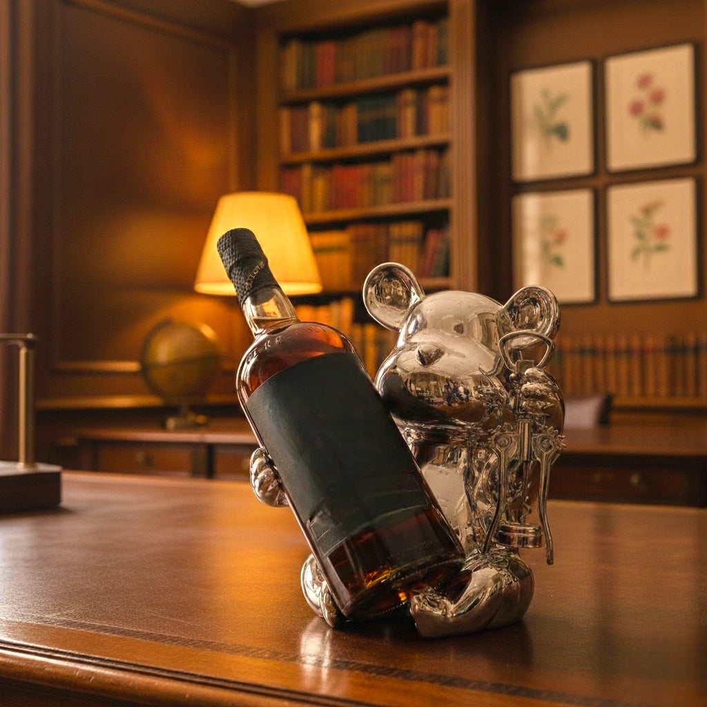 Luxury bear wine bottle holder featuring a chrome finish with an integrated corkscrew, designed to display wine bottles while adding elegance to home bars, dining rooms and contemporary interiors.