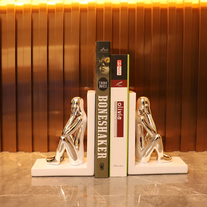 Artistic silver bookends featuring abstract human figures for elegant modern interior styling