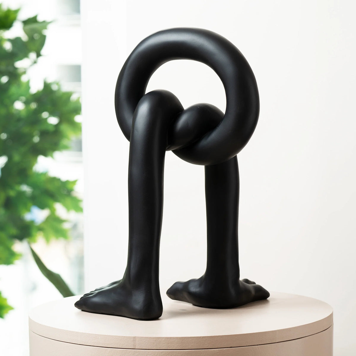contemporary abstract decor piece with human legs design for modern interiors