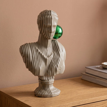 Neutral beige ribbed human bust decor sculpture with green accent sphere, minimalist tabletop decor for modern homes, shelves and console styling