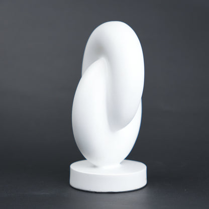 Infinity curve decor in matte white with smooth loop design for modern home styling