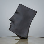 Contemporary artistic face decor for coffee table and shelf styling