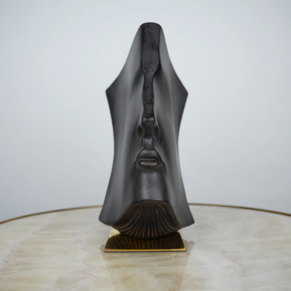 Contemporary artistic face decor for coffee table and shelf styling