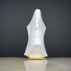 Abstract face decor piece in matte white finish, modern human form tabletop accent for living room, shelf or console styling