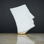 Abstract face decor piece in matte white finish, modern human form tabletop accent for living room, shelf or console styling