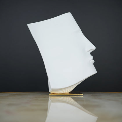 Abstract face decor piece in matte white finish, modern human form tabletop accent for living room, shelf or console styling
