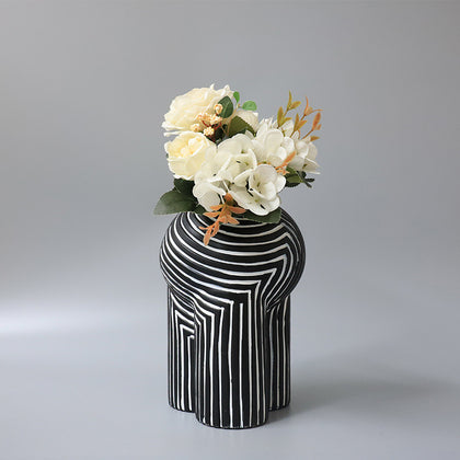modern decorative vase with fluid design for tabletop and console styling