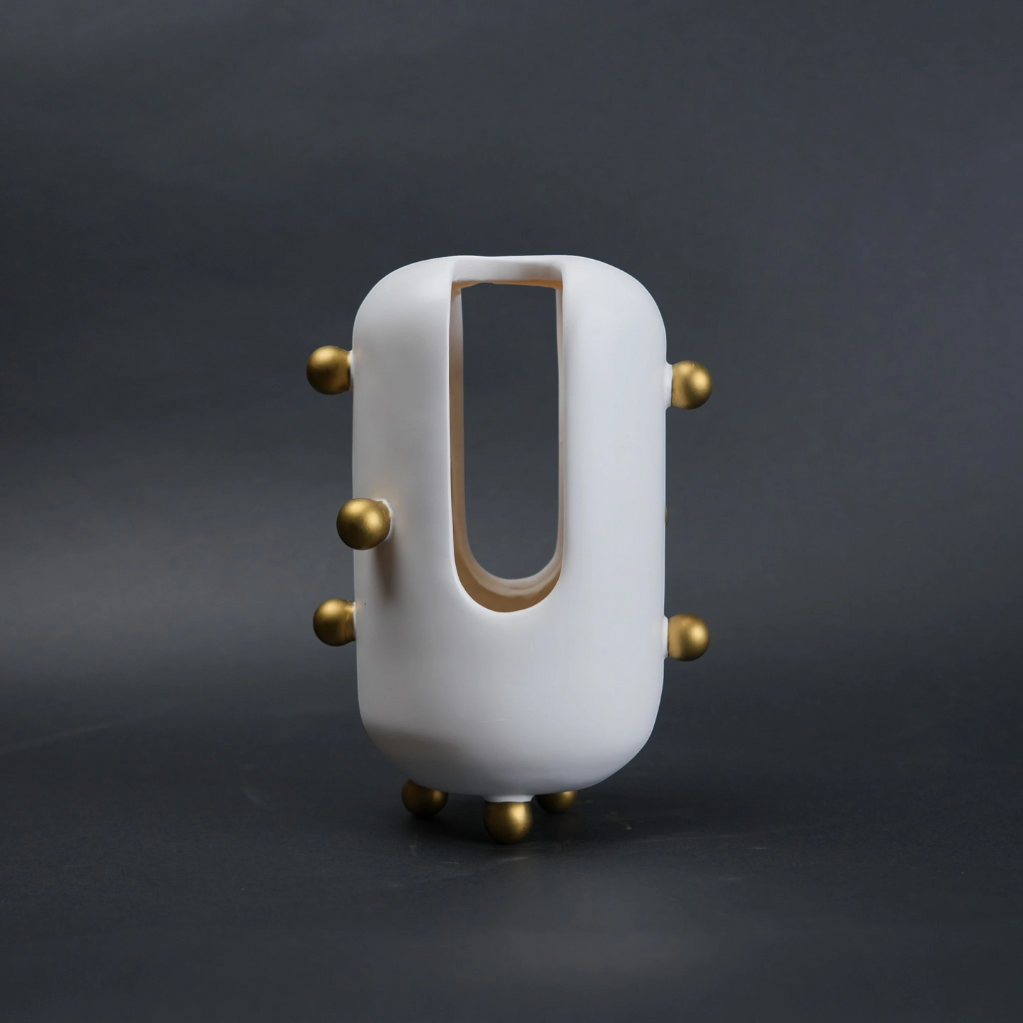 Modern decorative accent with spherical studs