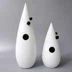 Abstract white decorative accent featuring gold details for contemporary home decor styling