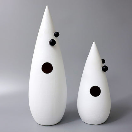 Abstract white decorative accent featuring gold details for contemporary home decor styling