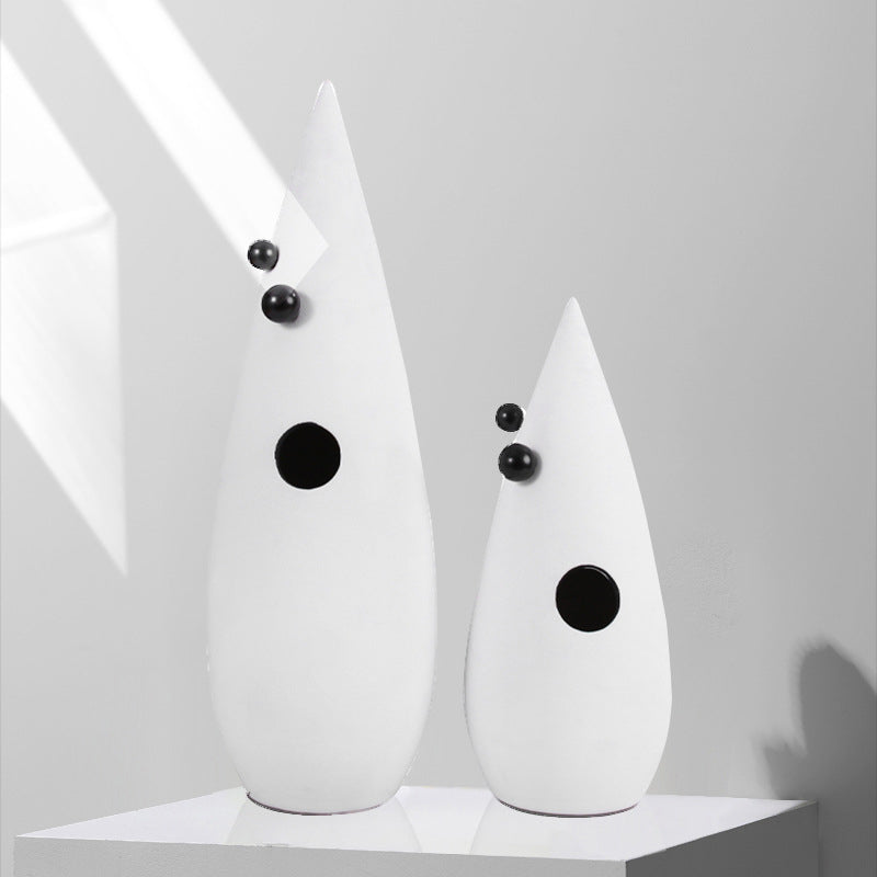 Abstract white decorative accent featuring gold details for contemporary home decor styling