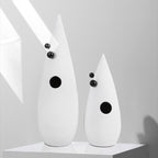 Abstract white decorative accent featuring gold details for contemporary home decor styling