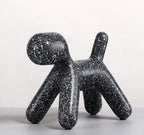 Contemporary black decorative dog accent featuring abstract balloon-inspired design for modern home interiors
