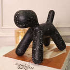 Contemporary home decor figurine featuring a textured black abstract dog design styled in a modern interior setting