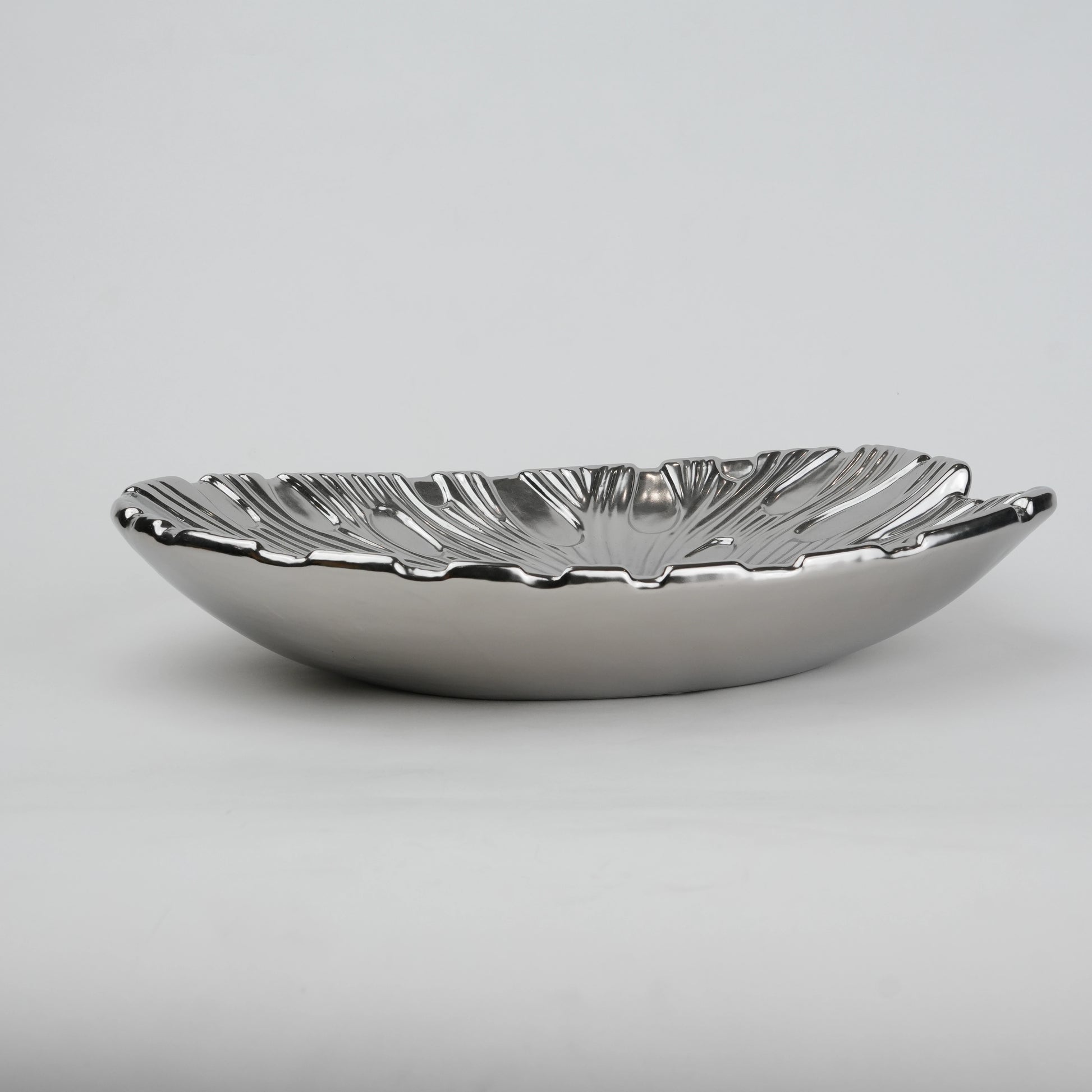 Gold and silver decorative serve plate with textured surface for table serving and home decor