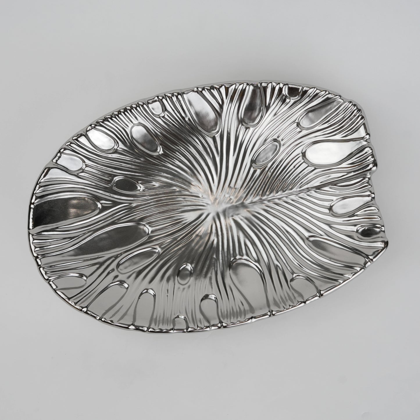 Gold and silver decorative serve plate with textured surface for table serving and home decor