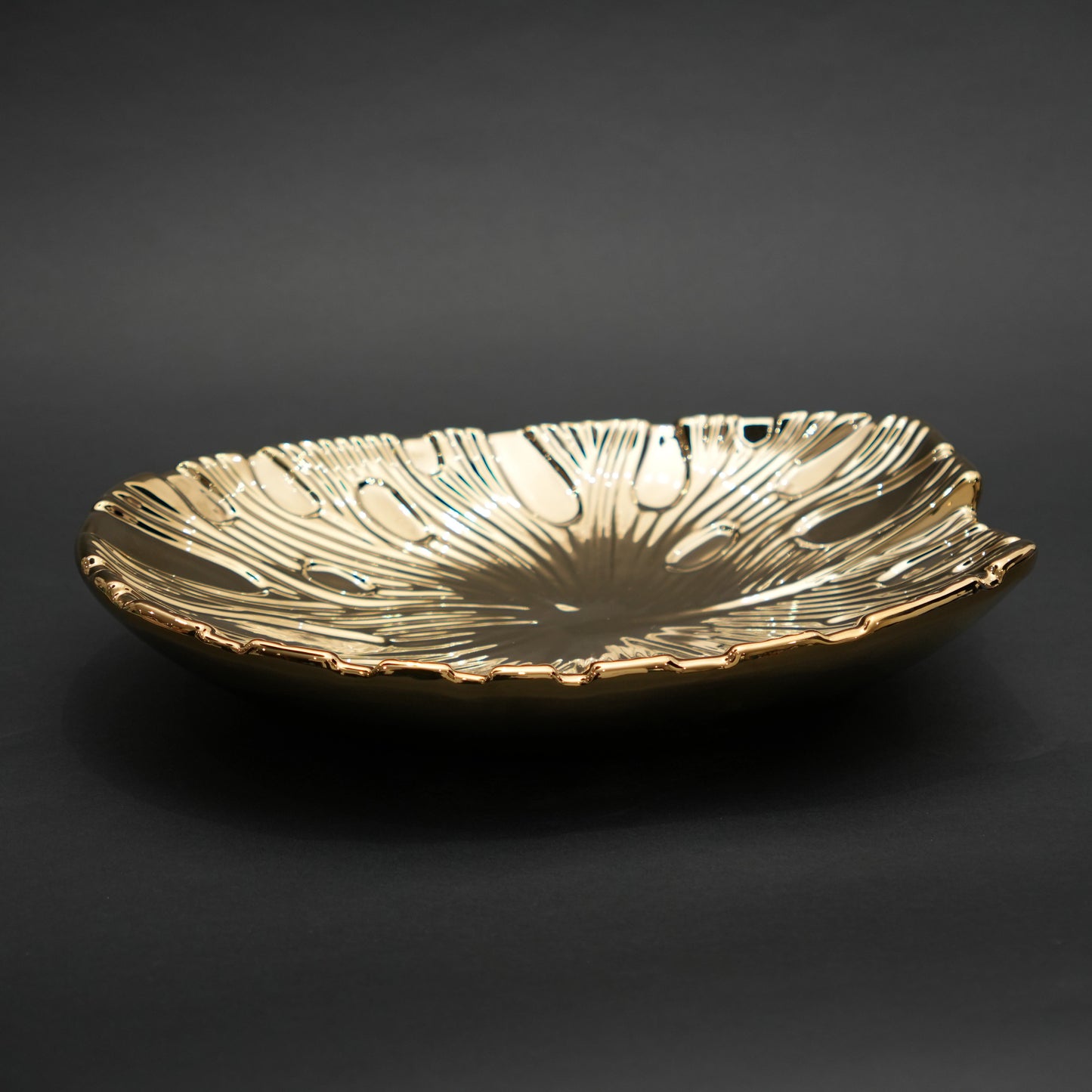 Gold and silver decorative serve plate with textured surface for table serving and home decor
