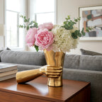 Contemporary artistic gold vase for elegant flower styling in modern living room interiors