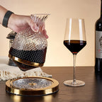 Modern whiskey serving decanter placed on a wooden coffee table in a sophisticated living room setup