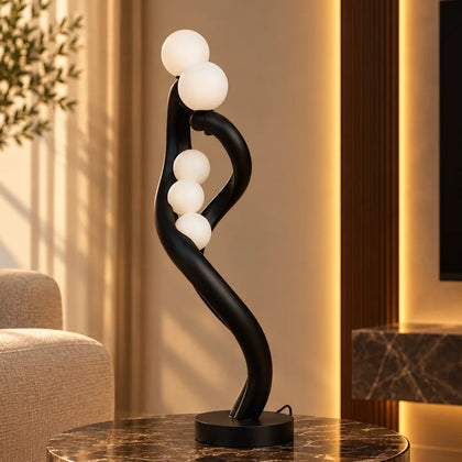 Spiral lamp w/ 5 frosted spheres, marble table
