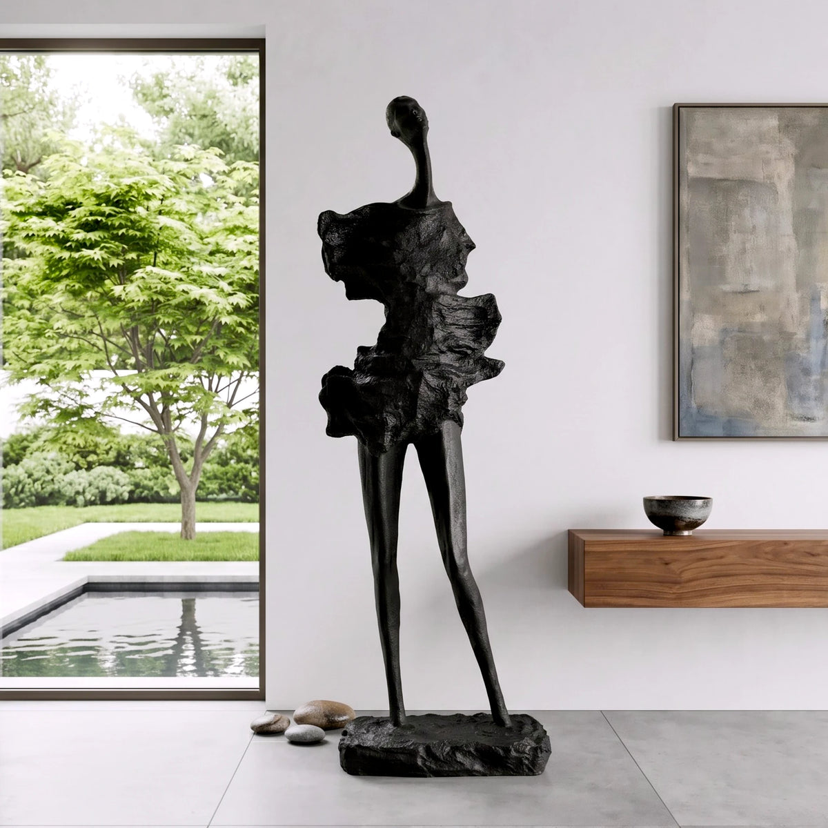 tall black sculpture human form living room statement piece