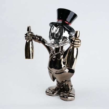 metallic duck figurine holding champagne bottles modern quirky home decor