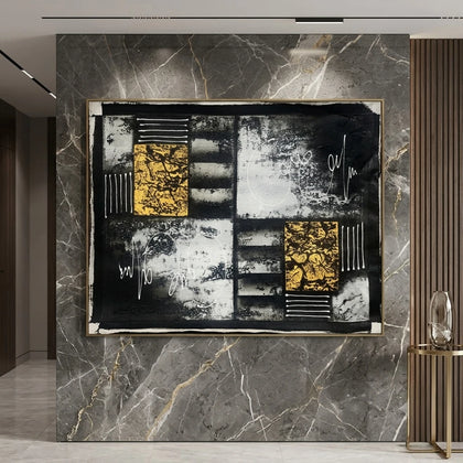 Modern abstract canvas painting featuring bold black and white textured artwork with metallic gold geometric accents, contemporary wall art for luxury living rooms, offices and designer interiors.