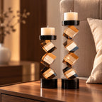 Contemporary twisted geometric candle holder in warm amber and black