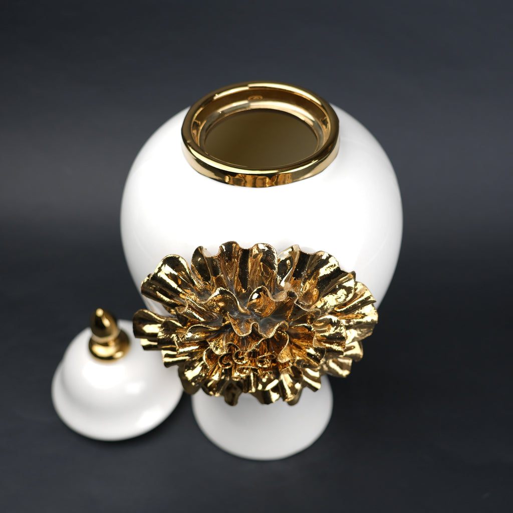 White ceramic decorative jar with gold laurel leaf band and lid