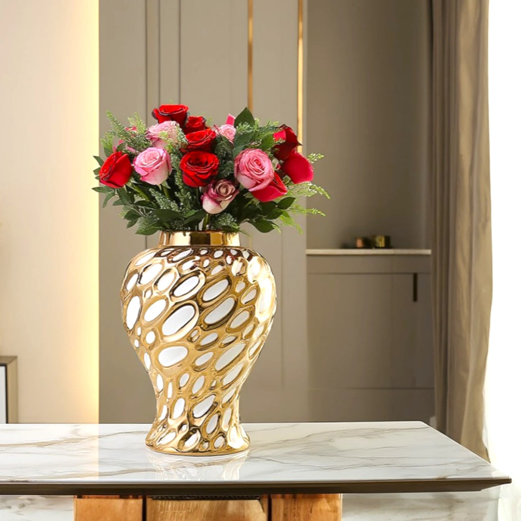 Large gilded form jar w/ roses on marble