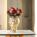 Large gilded form jar w/ roses on marble