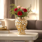 Small gilded form jar w/ roses, white table