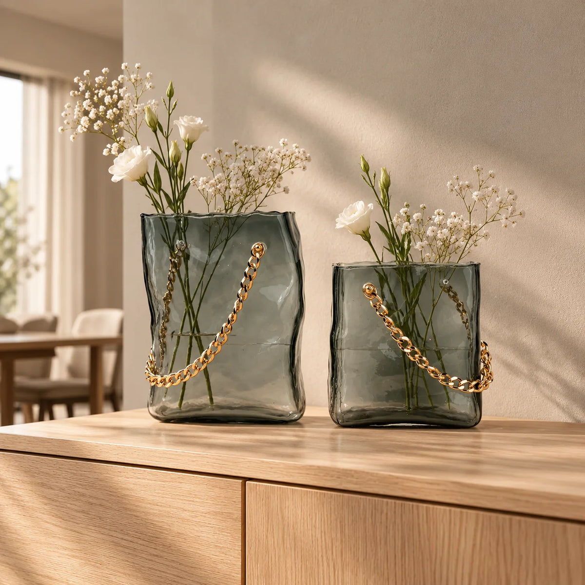 grey chain glass vase with gold chain detail