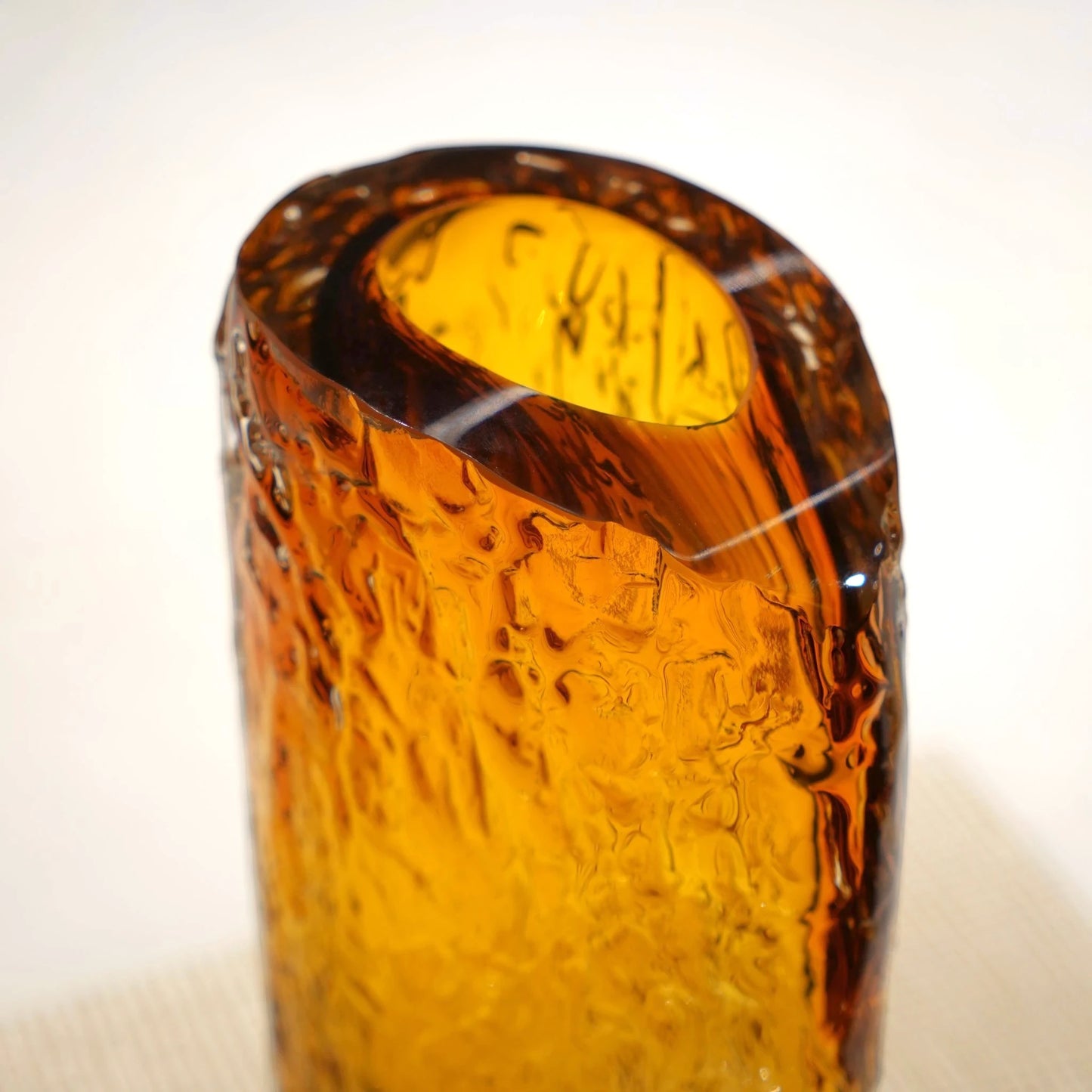 Premium textured glass flower vase with warm golden tones