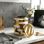 Big golden stroke jar, lid off, kitchen