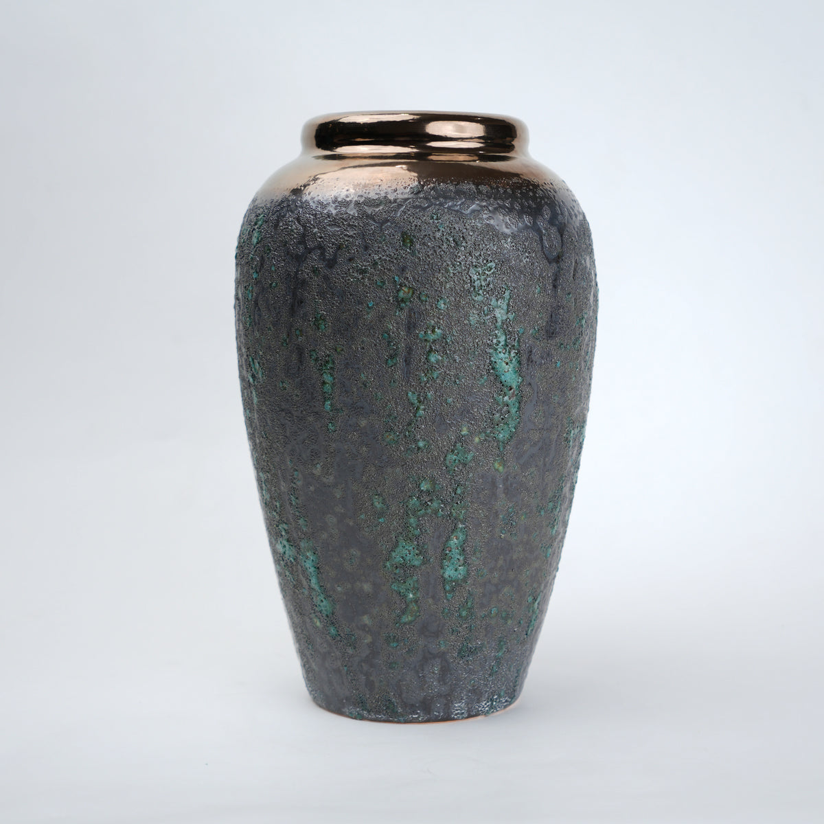 green charcoal ceramic vase with patina texture and bronze neck