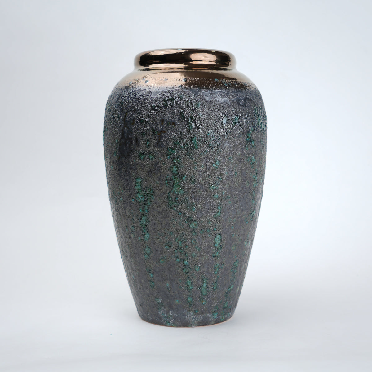 green charcoal ceramic vase with patina texture and bronze neck