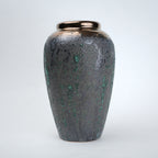 green charcoal ceramic vase with patina texture and bronze neck