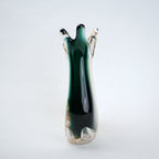 Green glass vase with a unique design on a white background