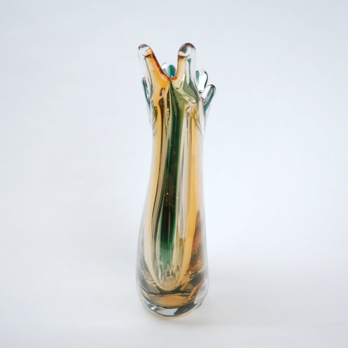 Glass vase with multicolored design on a white background