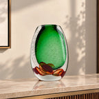 Green clear glass vase with decorative bubble base
