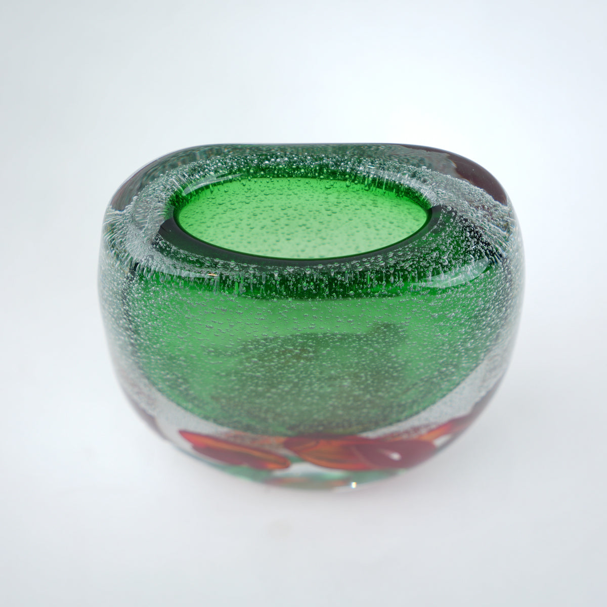 Green glass vase, top-down close-up detail