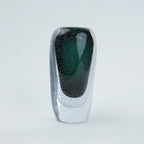 Green vase, elongated dark form, front white