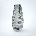 Decorative glass vase with textured design