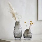 Decorative glass vase with textured design