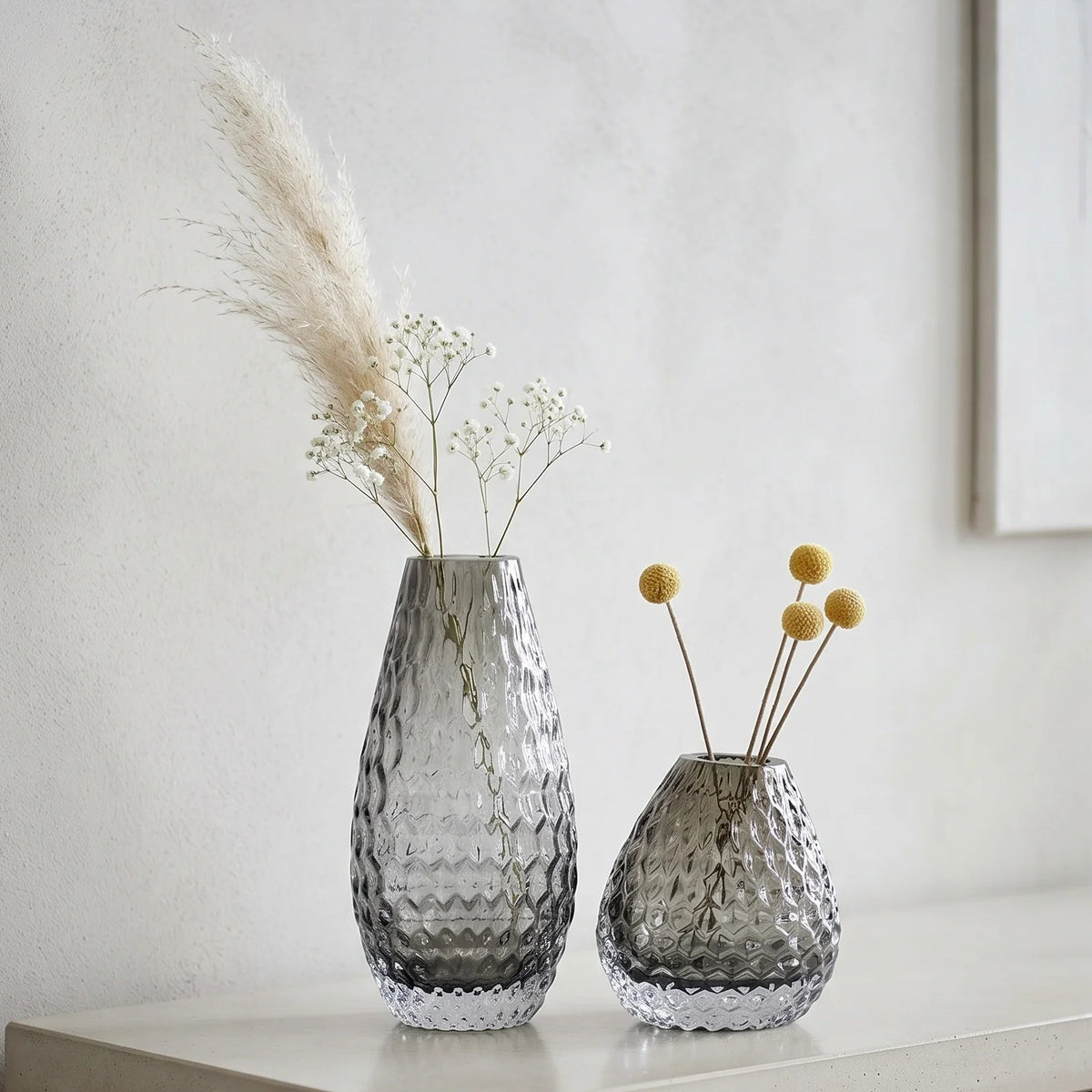 Decorative glass vase with textured design